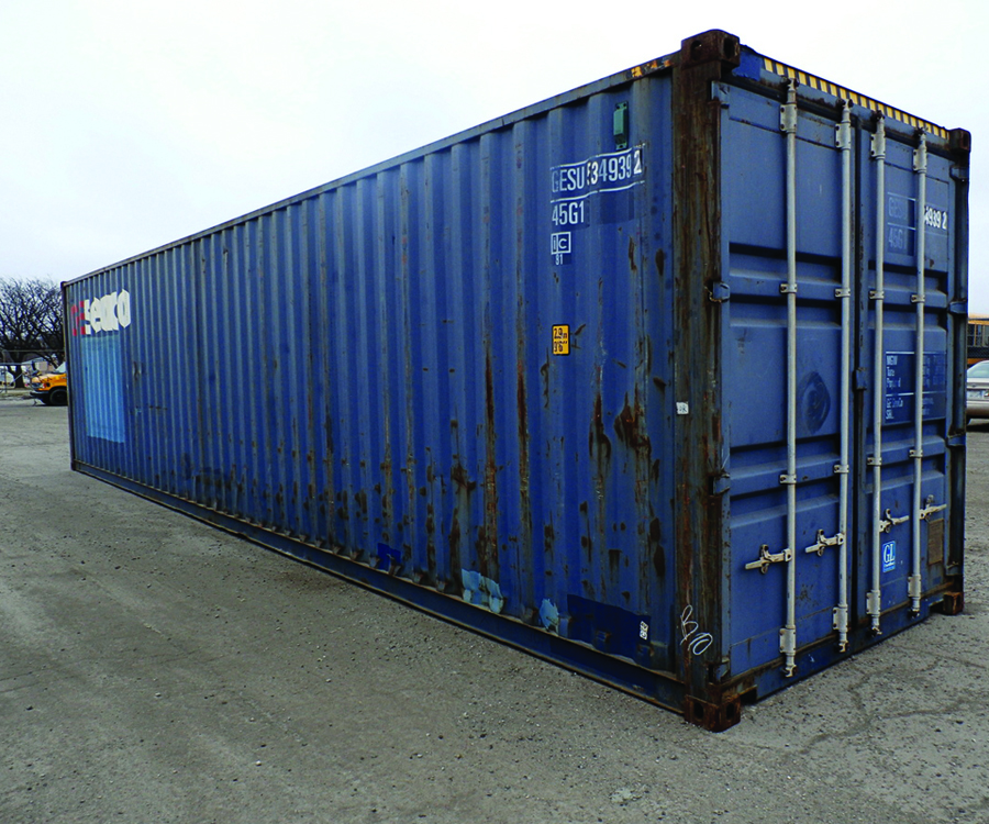 A side view of a blue shipping container