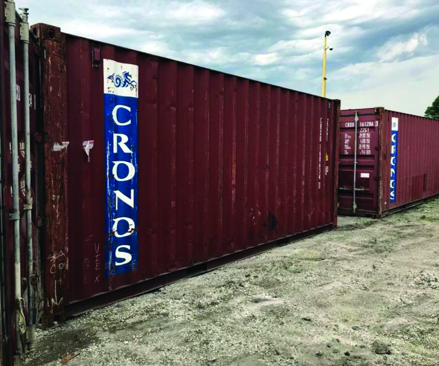 Red Cronos shipping container sold or rented by River Valley Truck Parts
